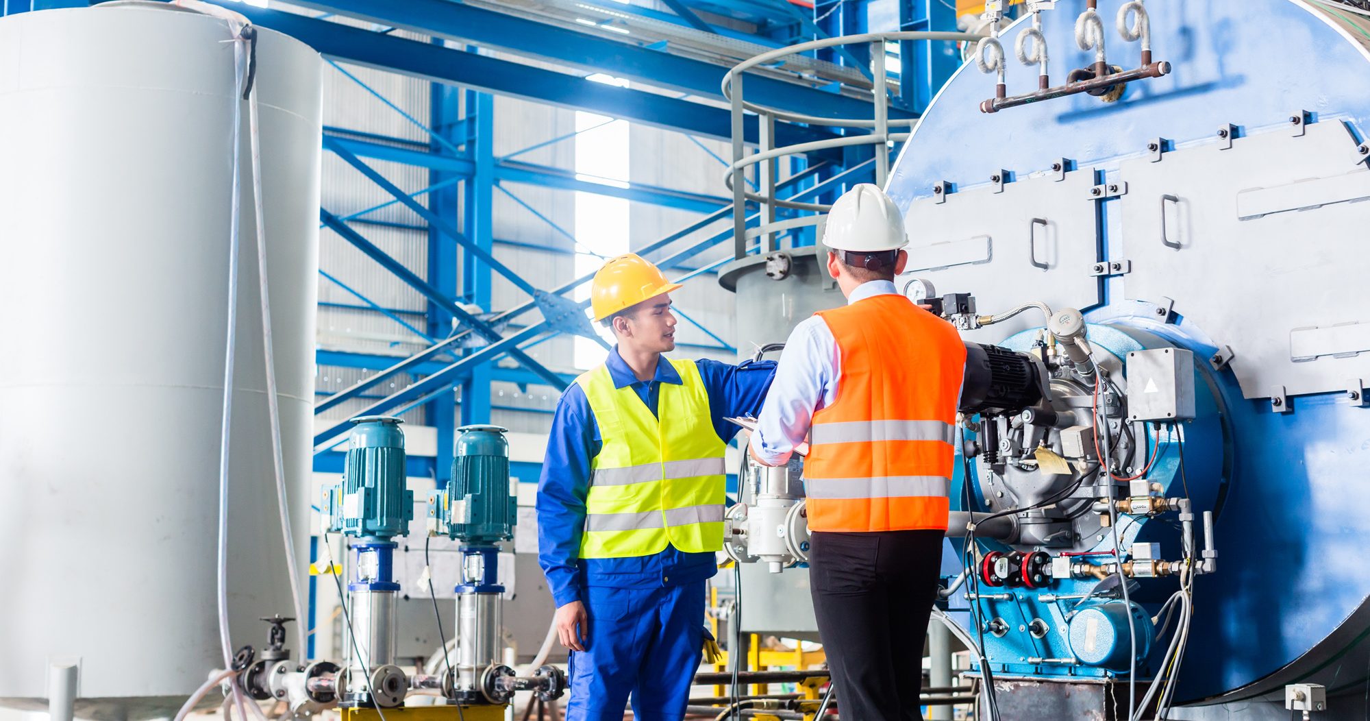 Worker And Manager at Industrial site