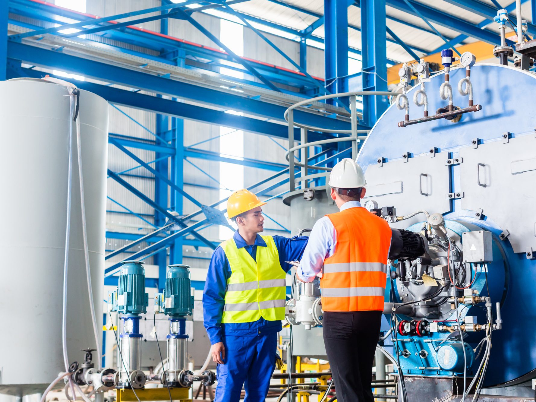 Worker And Manager at Industrial site