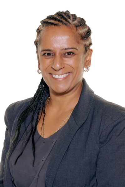 A woman smiling at the camera