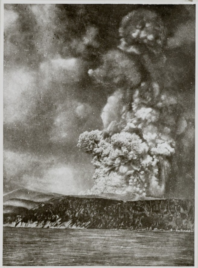 Historic black and white photograph of explosion of Krakatoa, seen from the sea: large clouds of dust and smoke rise up in the air. The image has been historically retouched and enhanced in a fashion typical of late 19th to early 20th century photos to bring out the key subject. 