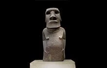 Large human figure made of stone.