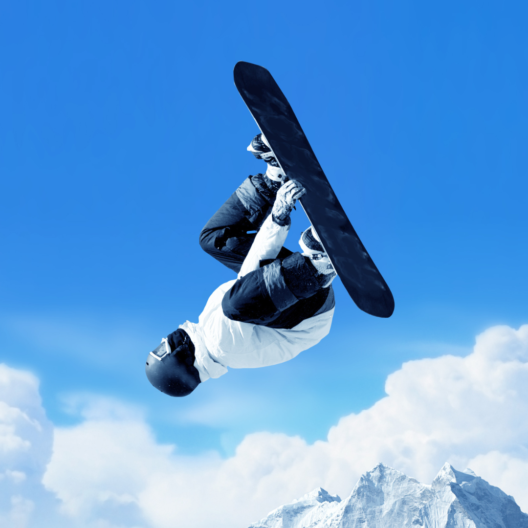 Person doing a flip on a snowboard