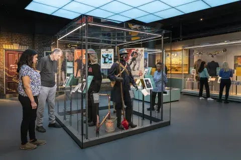 Visitors exploring the Second World War exhibition