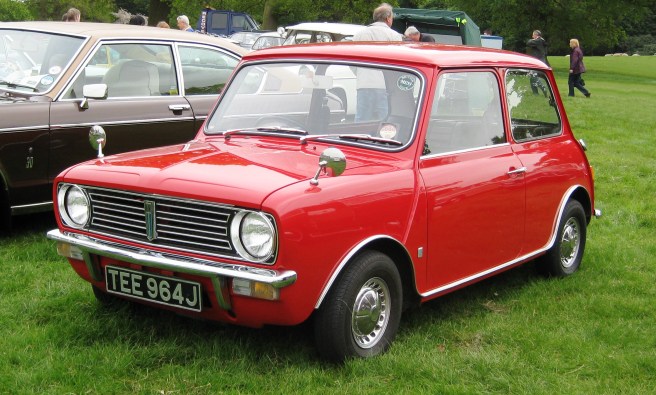 Modern photo of red J registration car at a car rally