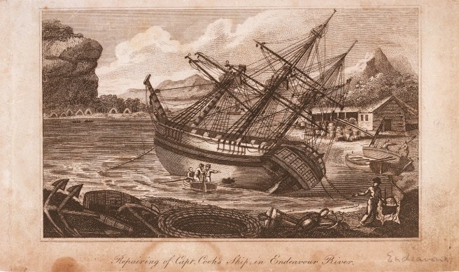 Historic black & white engraving of a three-masted ship heeled over for repair in the river with people in boats inspecting the ship's bottom, and anchors, casks and ropes visible in the foreground.