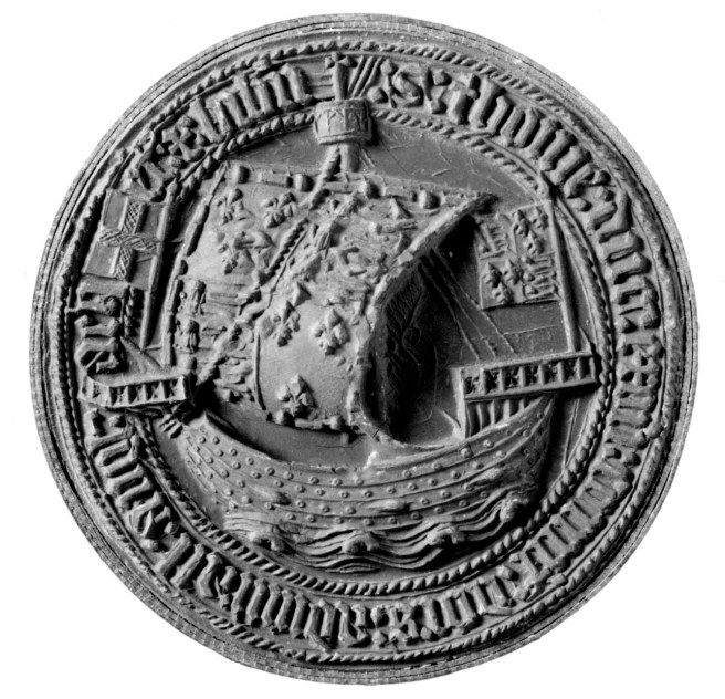 Black and white photograph of an impression from a medieval seal, featuring a sailing ship enclosed in a roundel of Gothic text