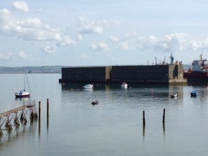 Two sections of Mulberry Harbour used for the D-Day landings of 1944 and relocated to Portland Harbour in 1946. Listed Grade I