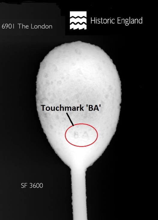 Spoon seen in x ray as white against a black background, with red ring around the letters BA on the spoon. At top of image above the spoon is the Historic England logo.