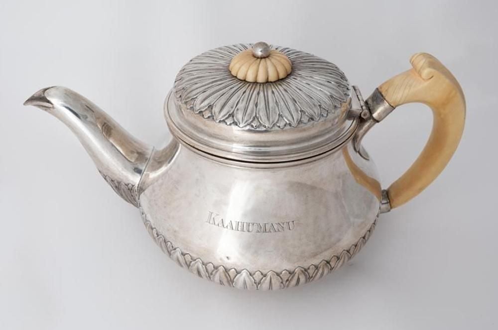 Silver and ivory teapot with 'KAAHUMANU' carved into it.