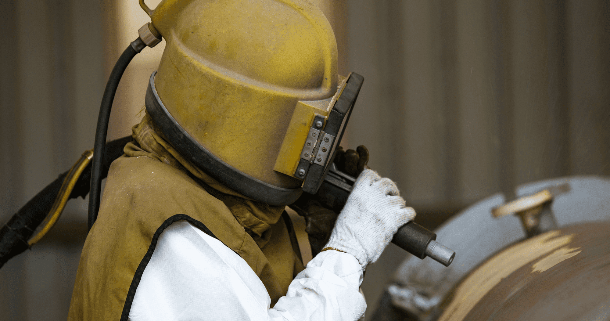 Fabric Maintenance  Surface Preparation By Sand Blasting