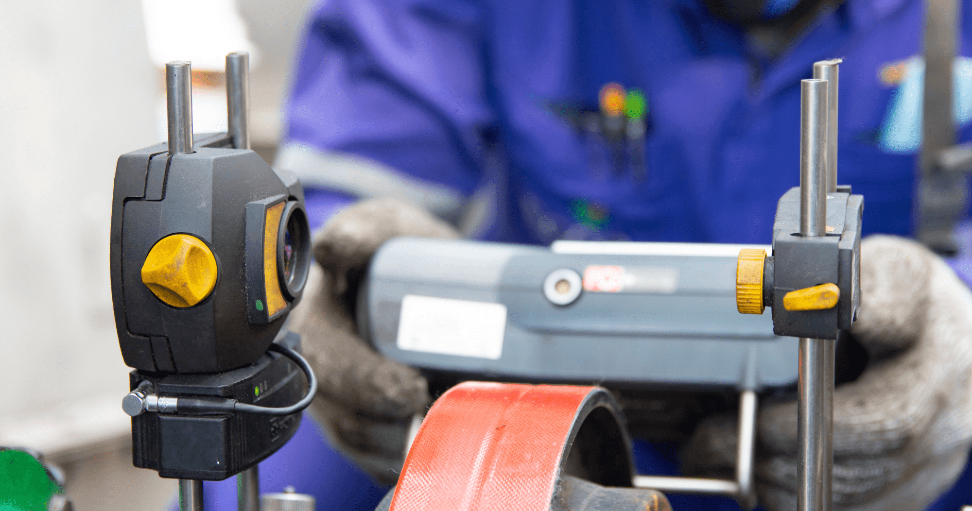 Mechanical Technician Aligning Shaft With Laser Shaft Alignment Tool. Find out more about ECITB mechanical fitter courses