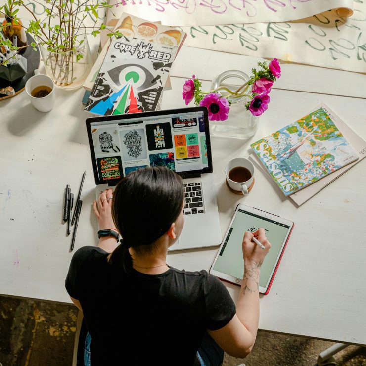 Female Working On Laptop computer At A Desk