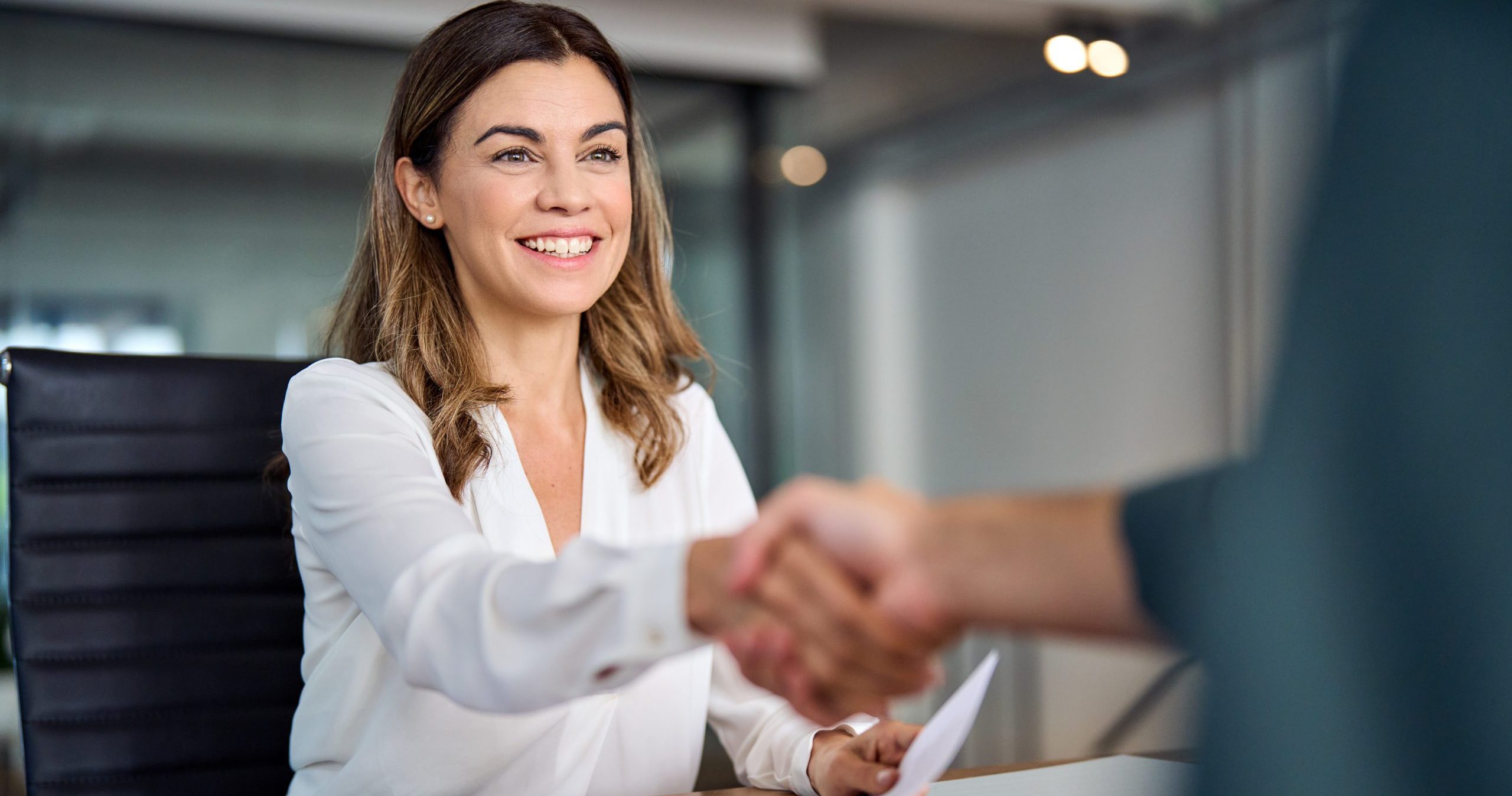ECITB suppliers page - Business woman shaking hands