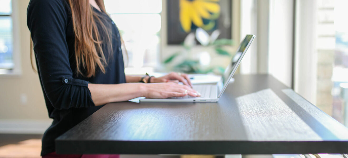Woman working at standing desk