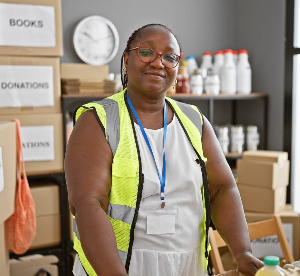 Woman in a high visibility jacket working for a charity