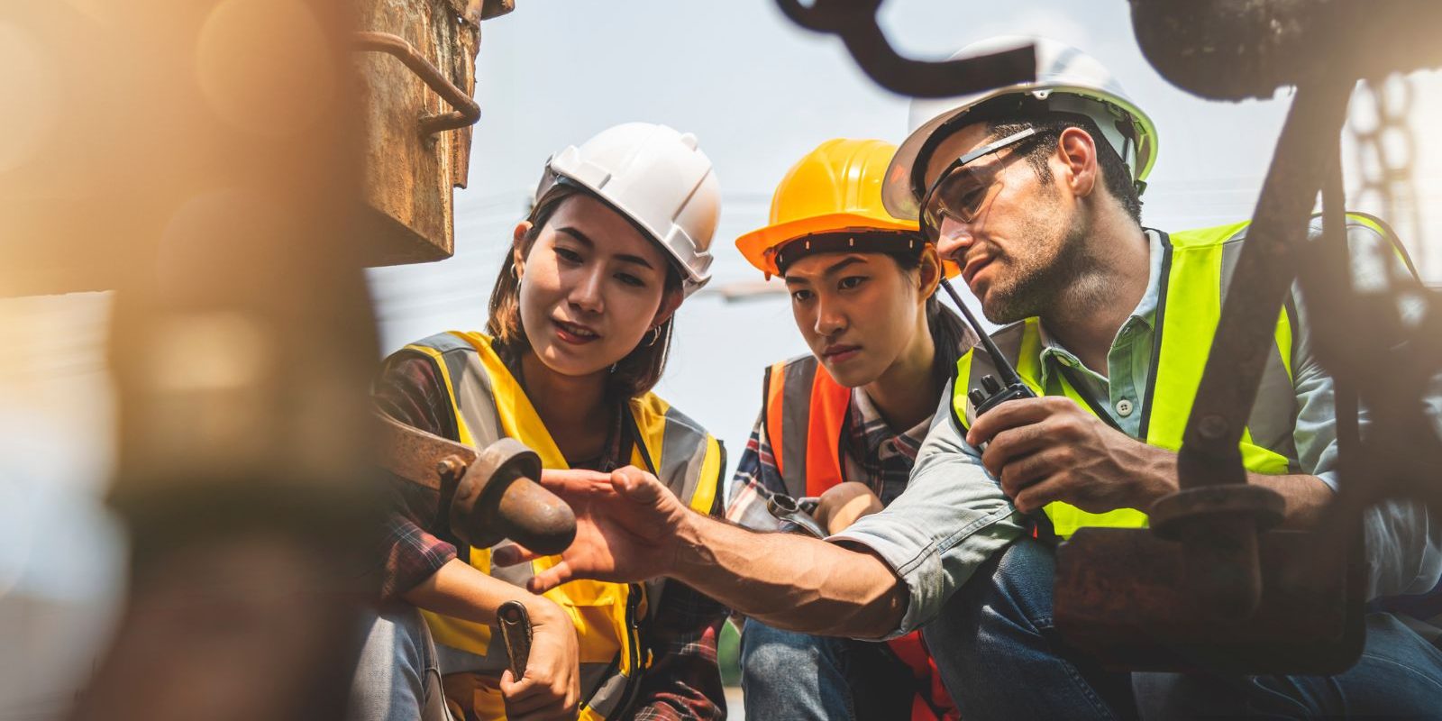 A Group Of Workers Working On Construction Site
