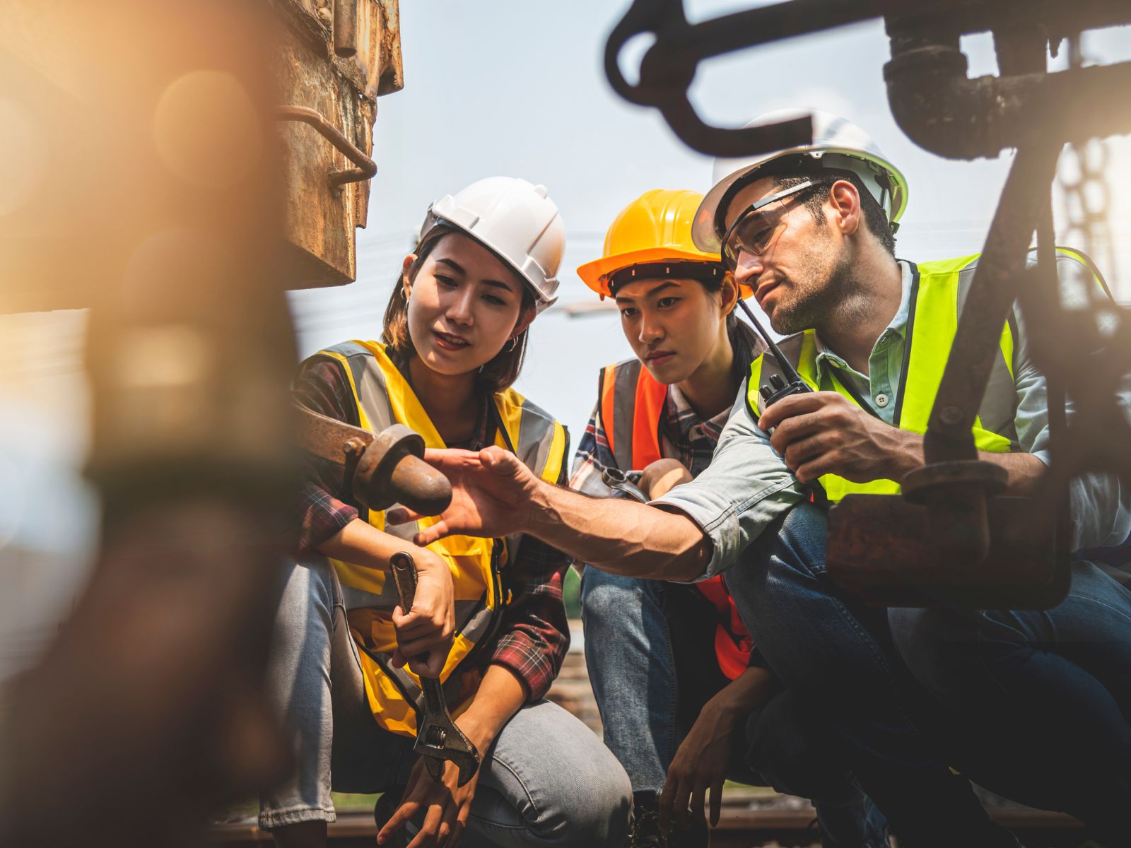 A Group Of Workers Working On Construction Site