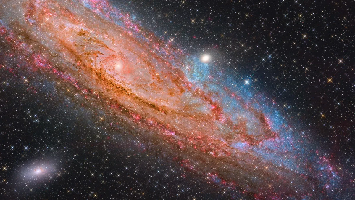 Close up of vivid, bright swirling Andromeda Galaxy in lots of detail, diagonal across the frame