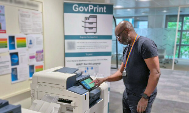 a man using a printer