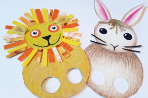 Two flat finger puppets - a lion and a rabbit