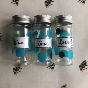 3 jars on a table cloth