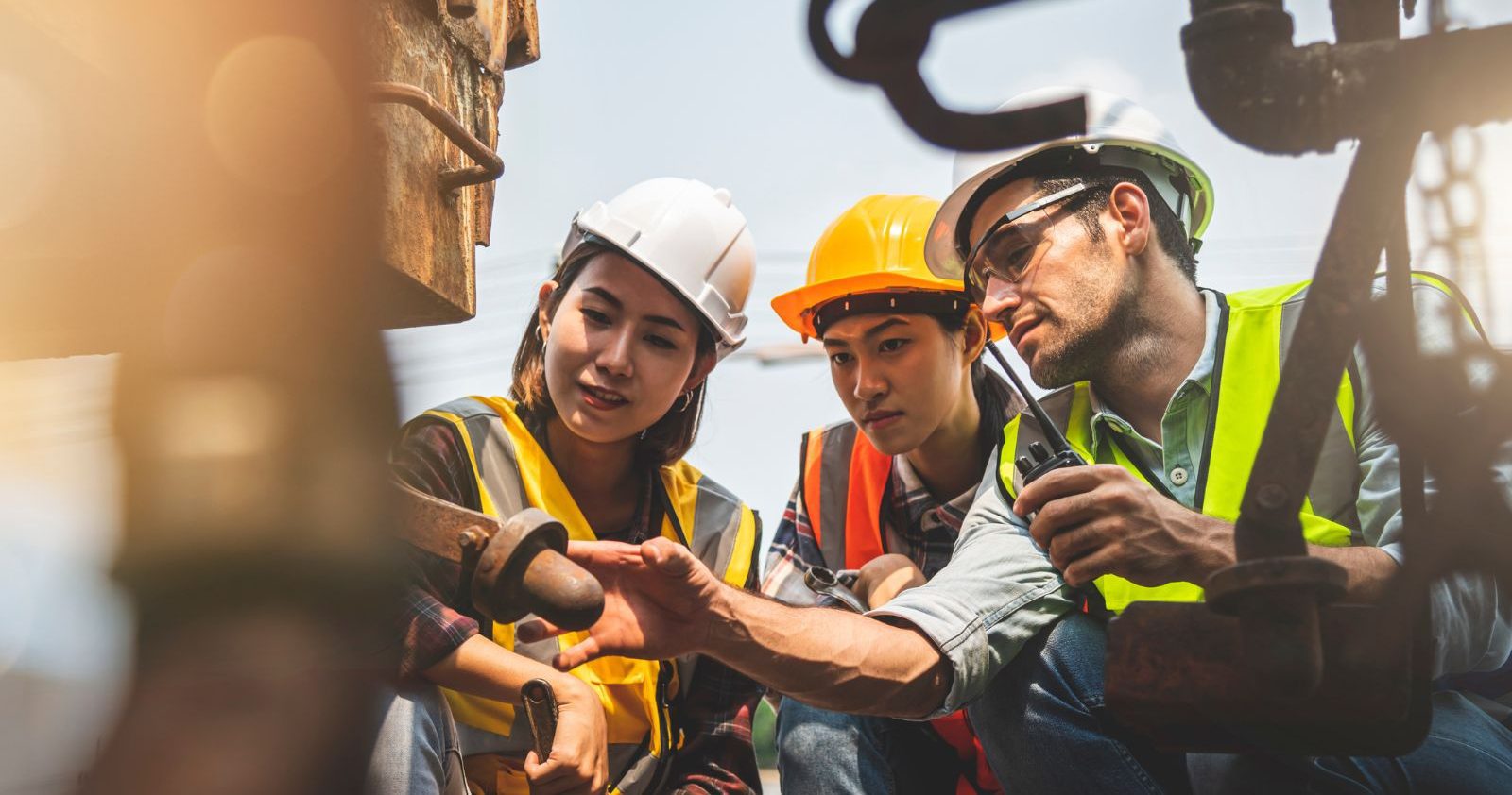 A Group Of Workers Working On Construction Site