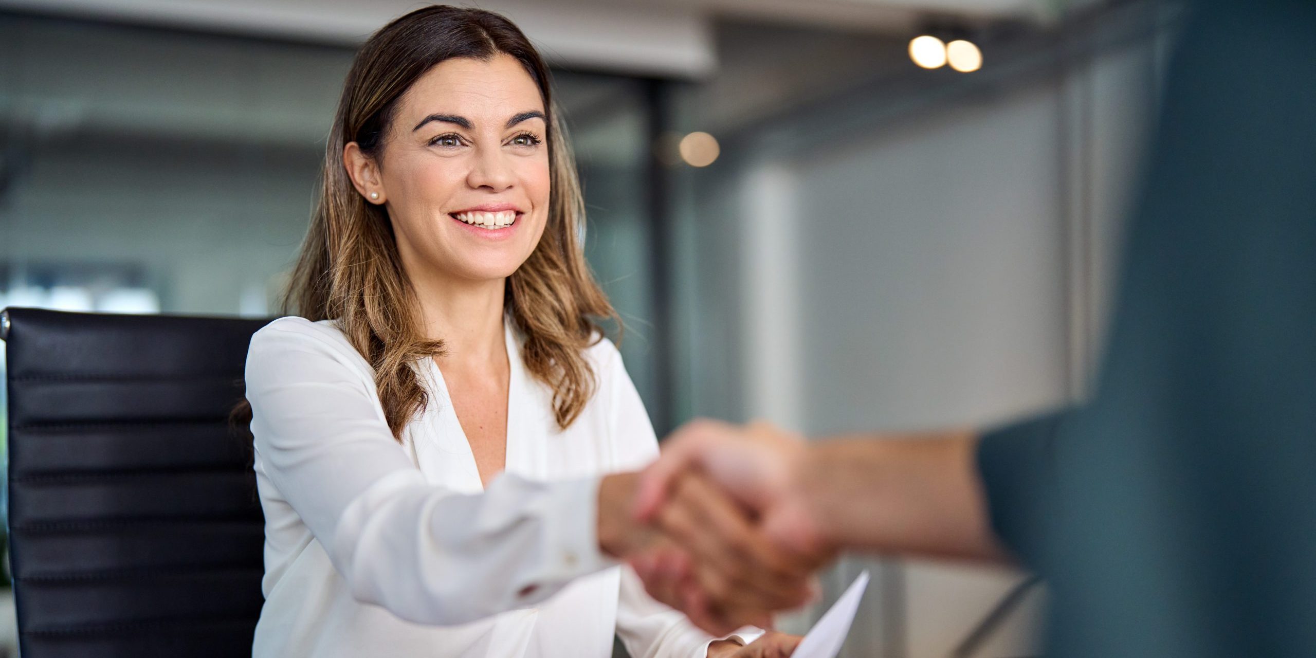 ECITB suppliers page - Business woman shaking hands