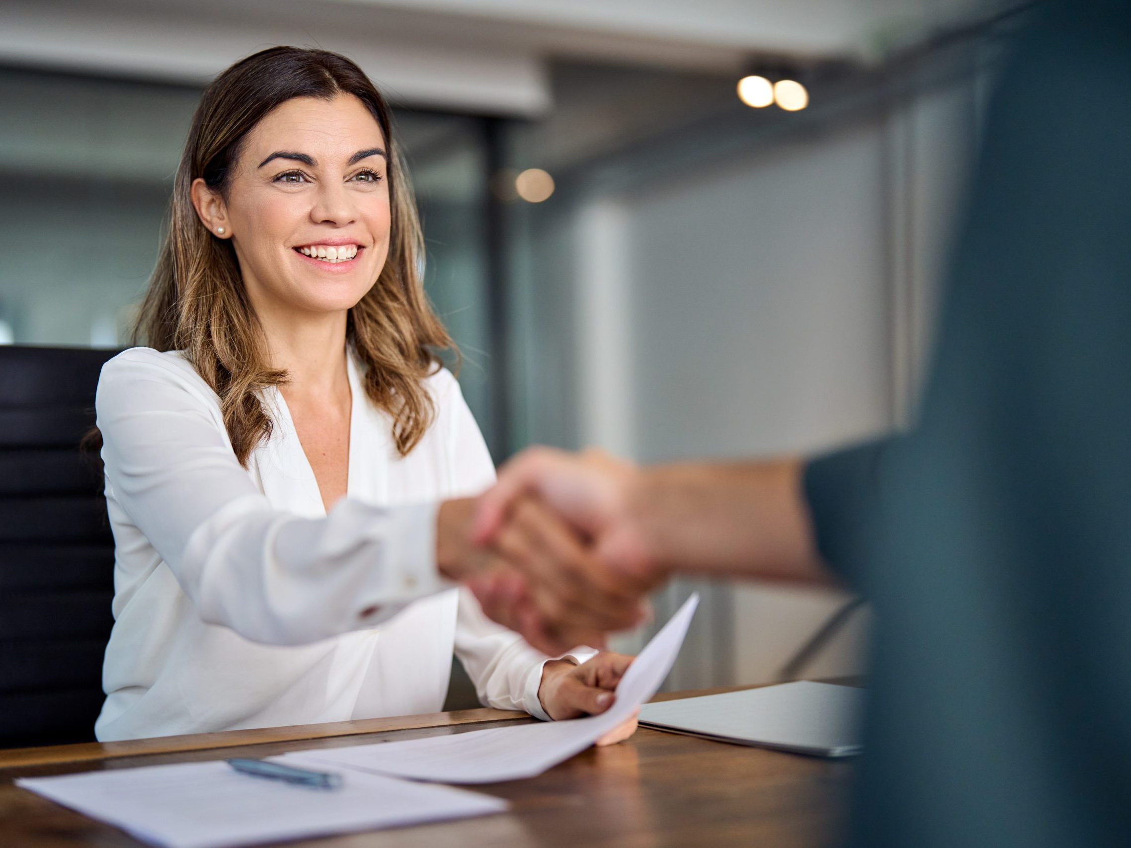 ECITB suppliers page - Business woman shaking hands