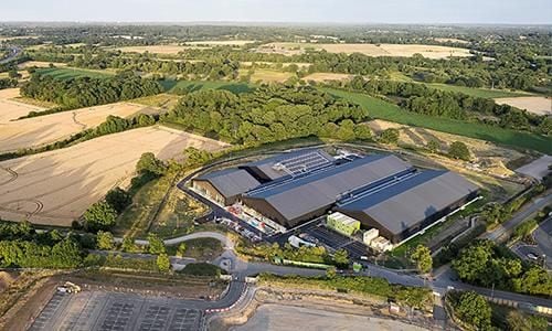 Aerial view of the completed BM_ARC building and surrounding countryside.