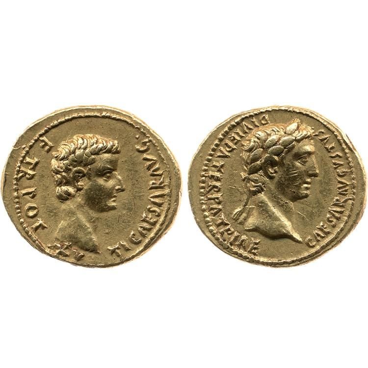 Two sides of a gold coin. The side shown on the left (reverse) depicts a man’s head facing right with writing and a dotted border around the edge of the coin. The side shown on the right (obverse) depicts a man’s head, wearing a laurel wreath, facing right. There is Latin writing and a dotted border around the edge of the coin.