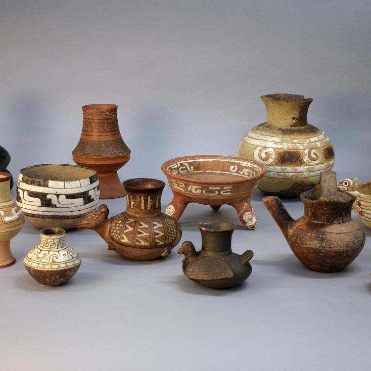 A set of 15 brown, terracotta and beige coloured ceramic vessels, some shaped like bowls, others like vases. 