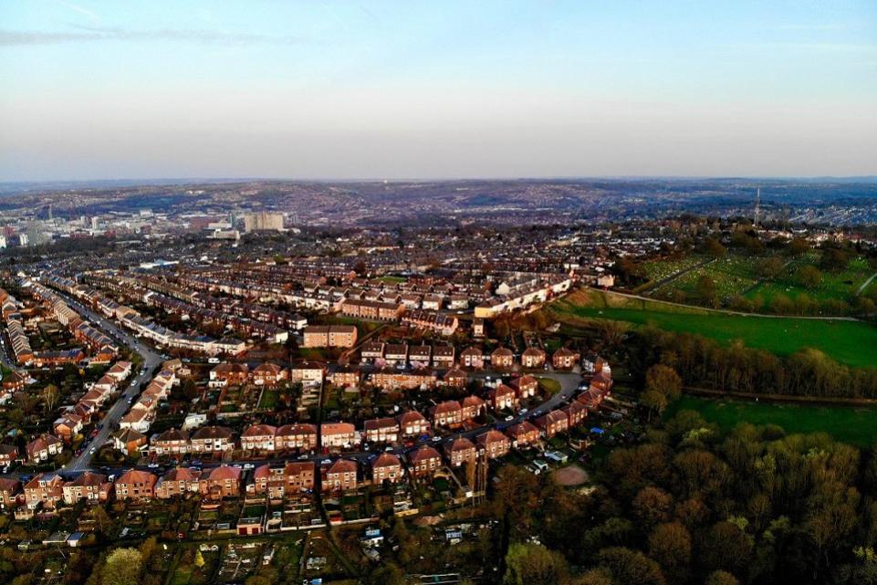 Ariel shot of a housing estate in a sunny setting