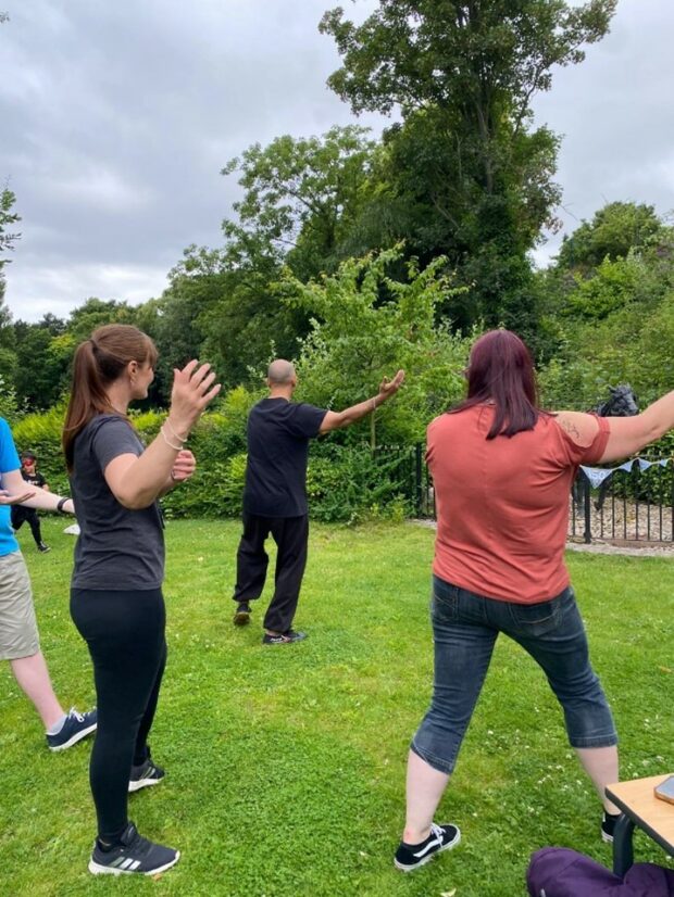 Group Tai Chi sessions in a nature space, such as this one led by Mettaminds CIC in Walsall, help participants develop a deeper connection with nature.