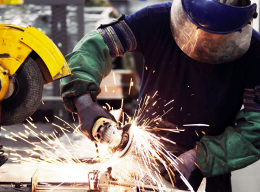 Man In PPE Working With Abrasive Wheels - find engineering training courses and ECITB courses in trade disciplines plus technical tests