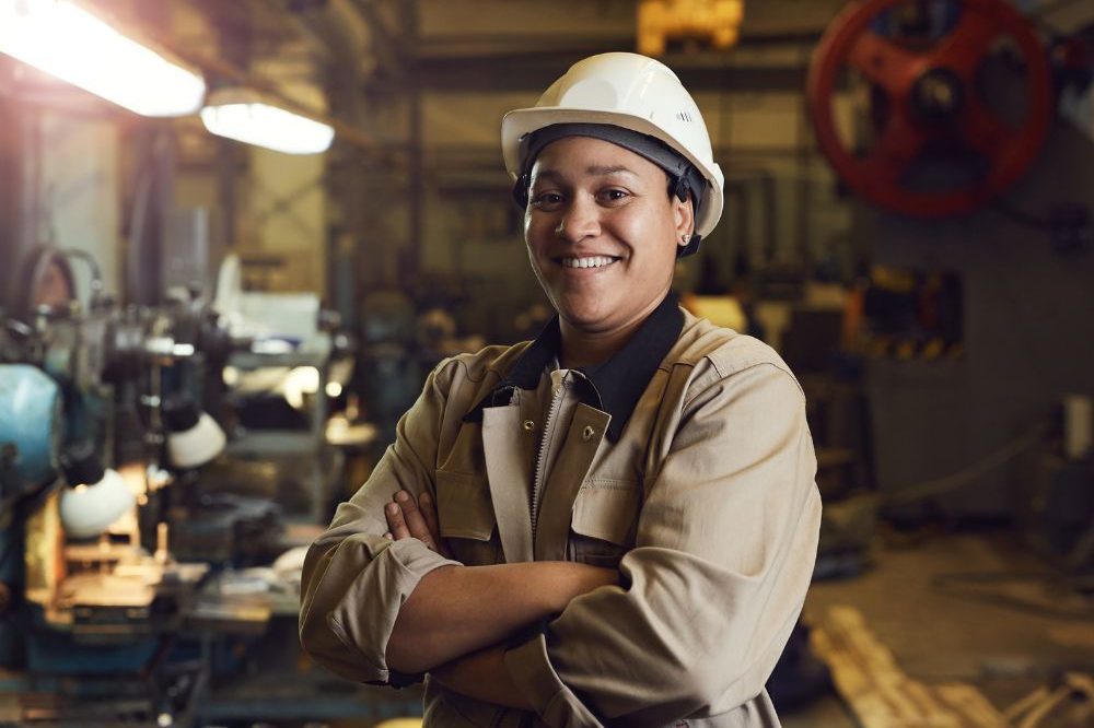 A Woman Working In A Factory