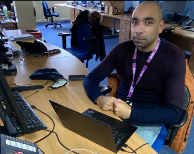 Probation officer at desk