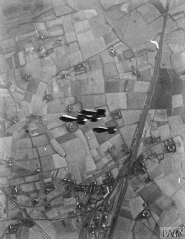 British bombs falling on to a target behind the enemy's lines during the First World War