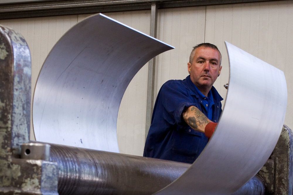 Man In Blue Top Plating