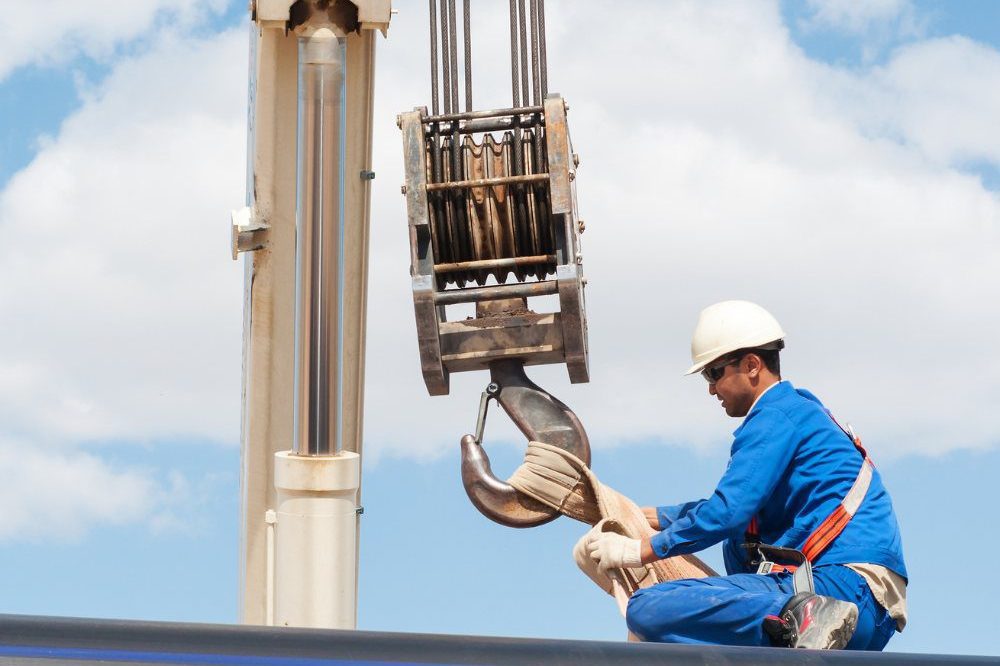 Man With Crane Erecting And Rigging