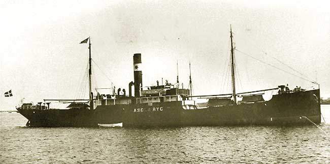 Black and white profile view of steamship with single prominent funnel.