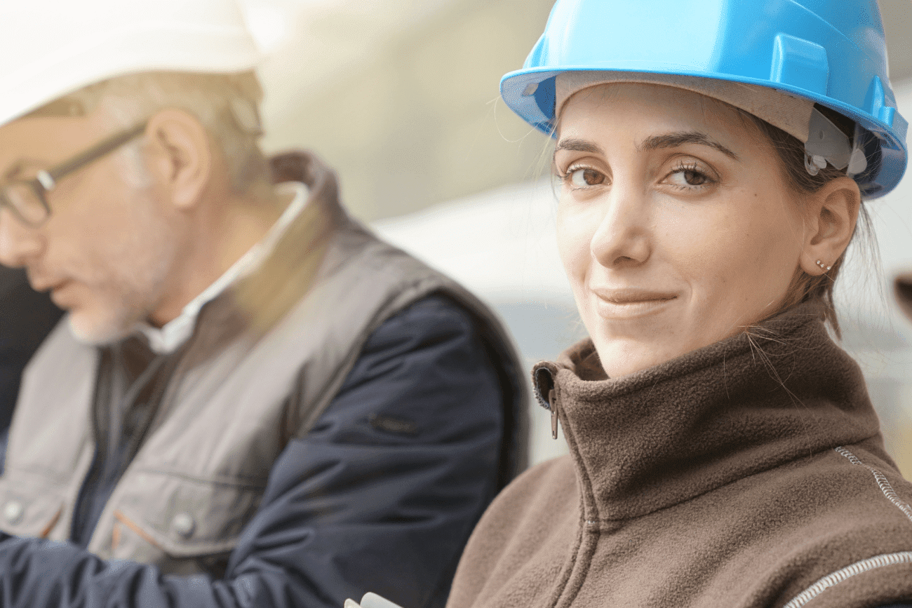 Woman Assessor In Hard Hat With A Man In A Hard Hat