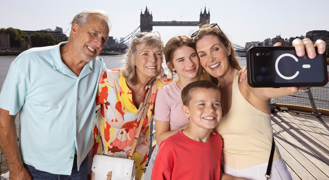 Family taking a selfie on the deck of HMS Belfast