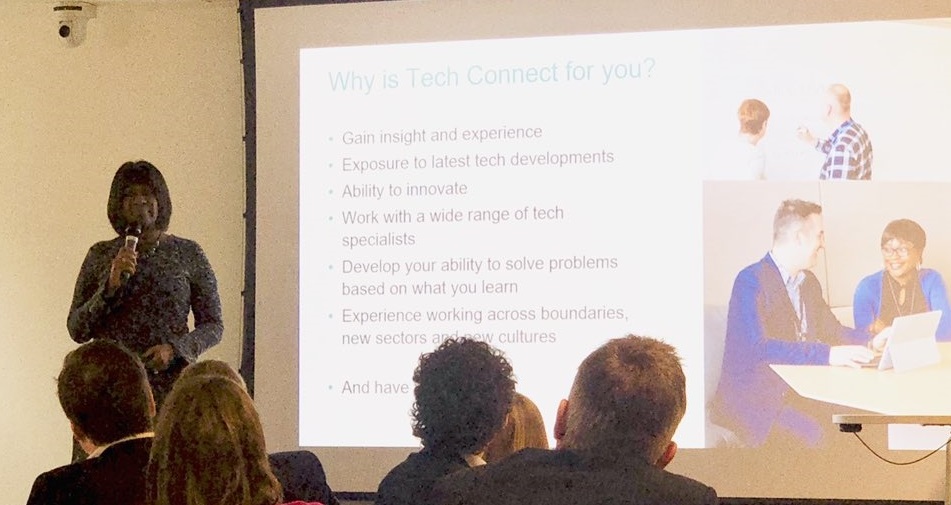 Jacky Wright presenting at the TechConnect launch in front of a large screen