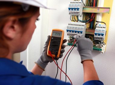 Woman Undertaking Electrical Testing