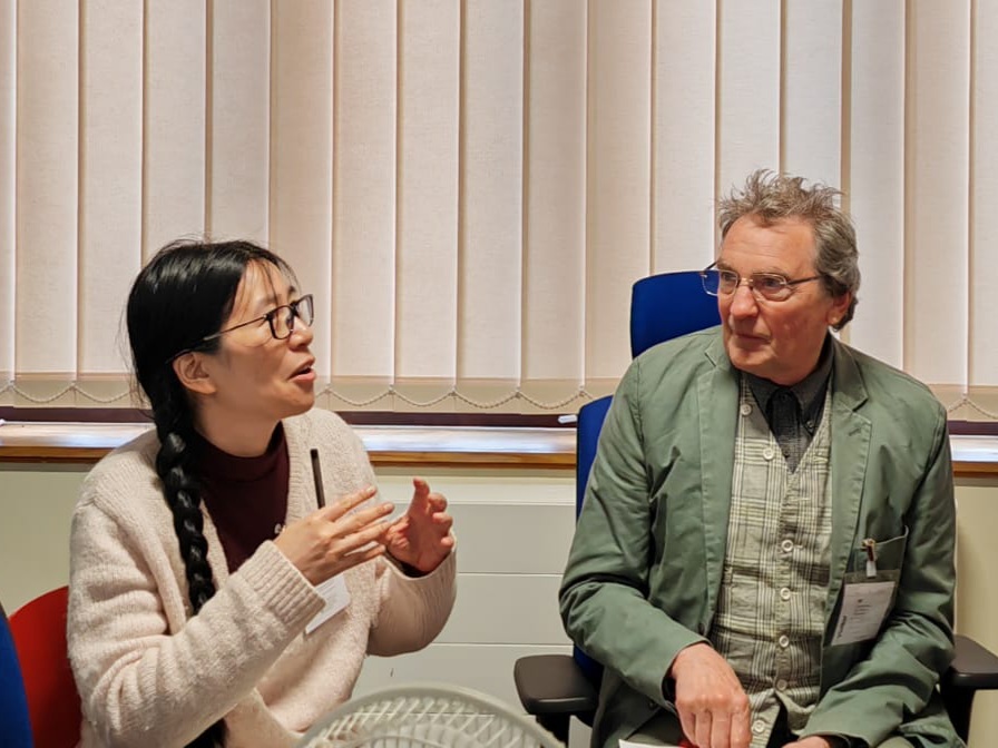 Social Security Advisory Committee members Rachel Chiu and Bruce Calderwood in discussion
