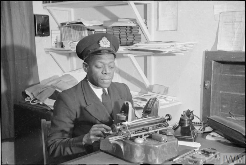 Mr Koi Obuadabang-Larbi, BA, Superintendent of West Indies House, a Merchant Seamen's Hostel works at the typewriter in his office.