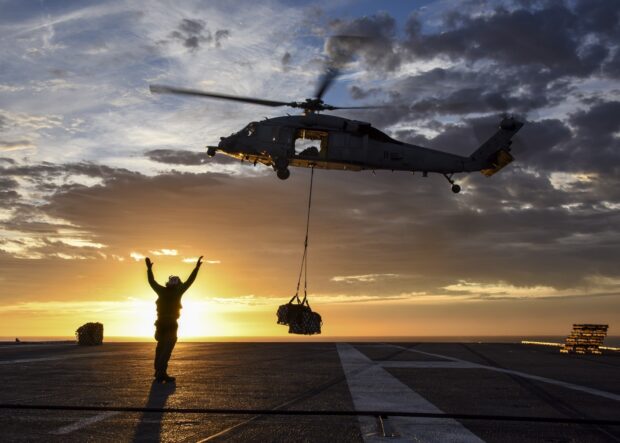 cargo drop by helicopter on airport runway