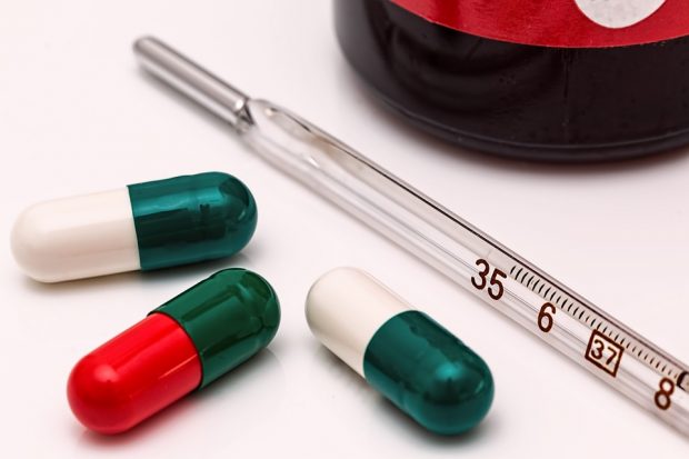 Pharmaceutical capsules and a thermometer