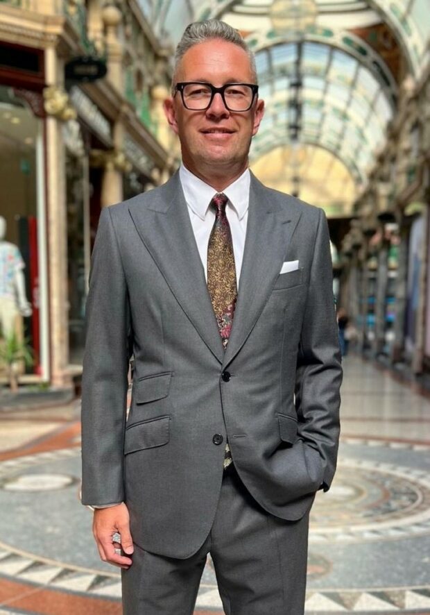 Richard Corbridge, CDIO dressed in a suit and tie in Leeds city centre.