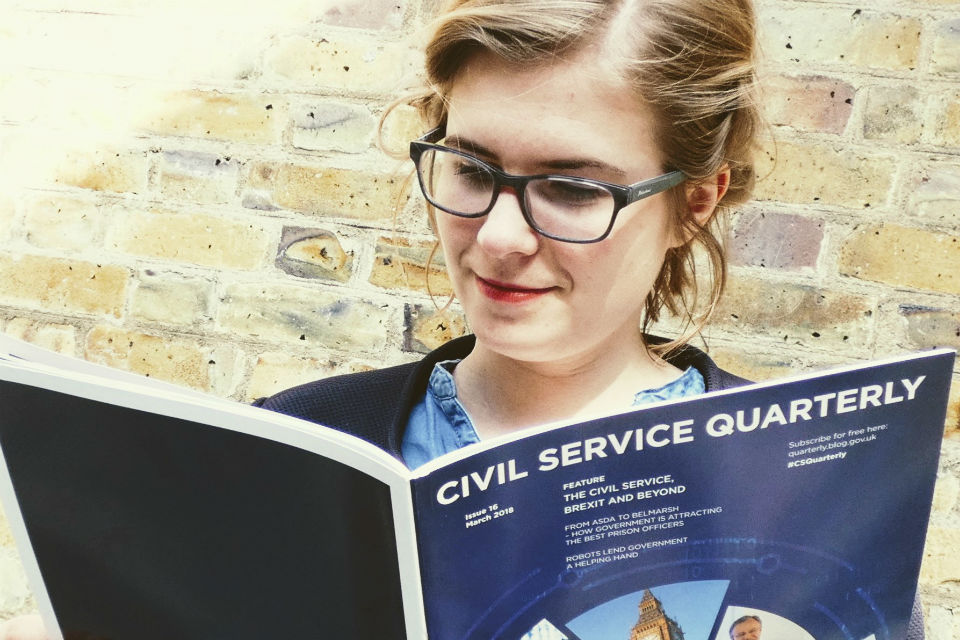 Woman reading magazine